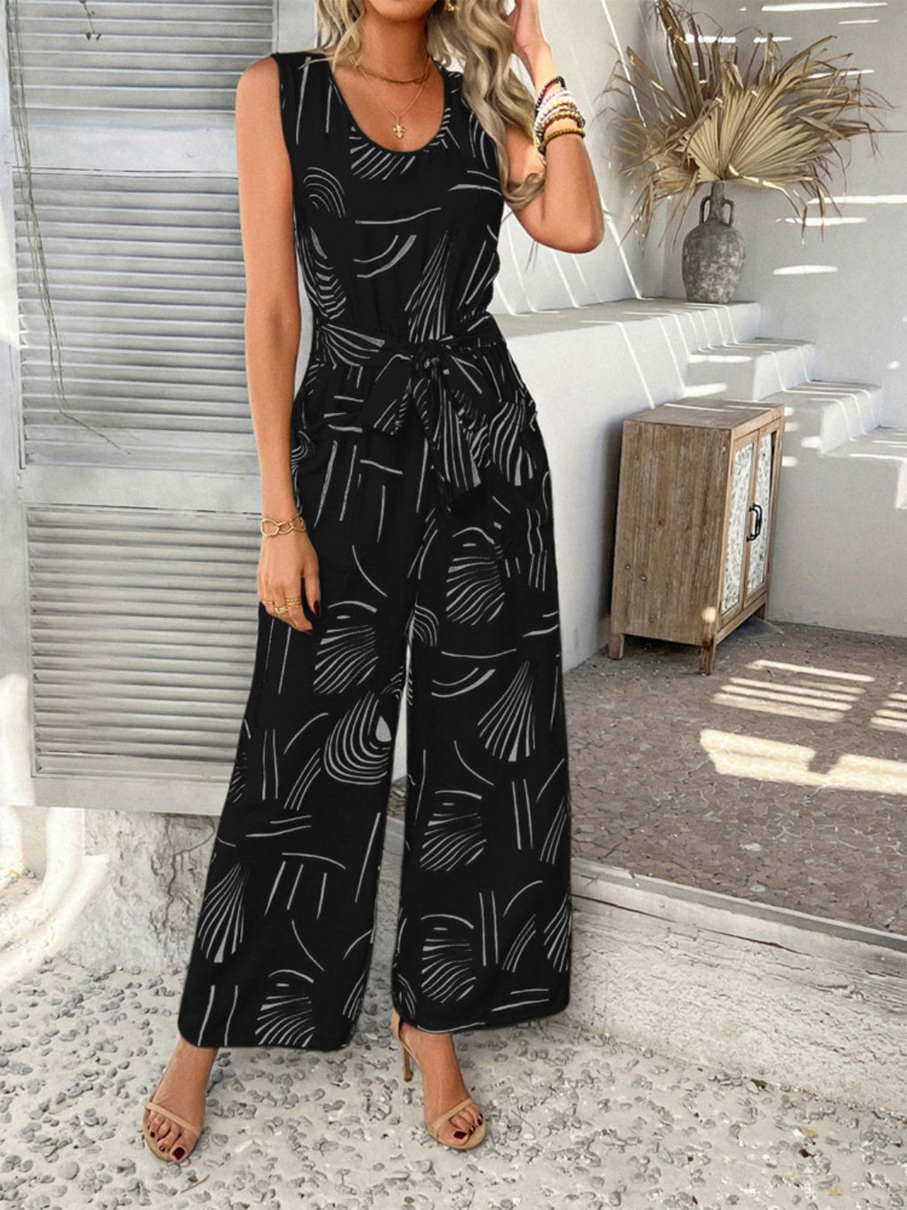 Devine Printed Round Neck Sleeveless Tie Waist Jumpsuit - ViarousViarousViarous