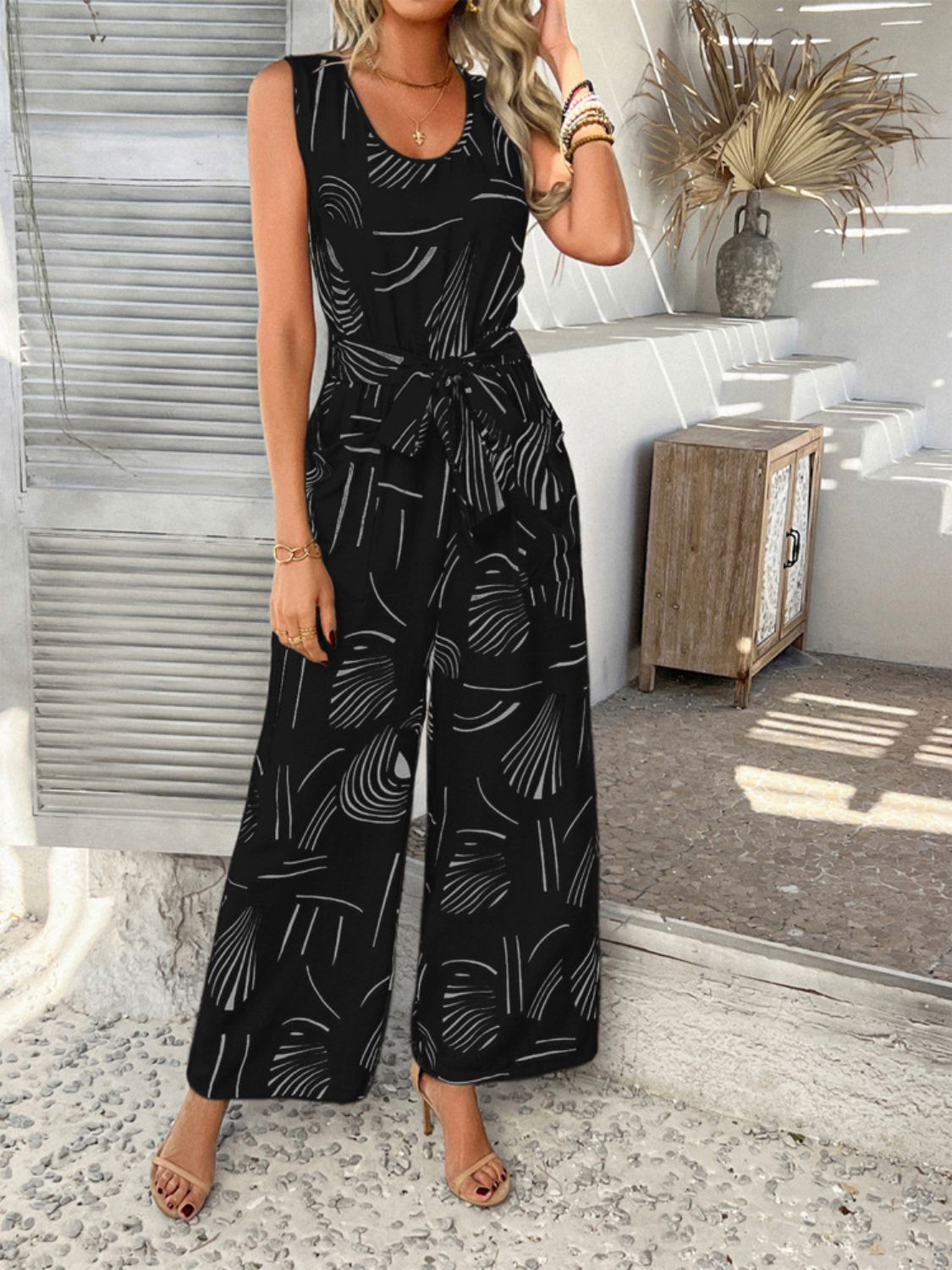 Devine Printed Round Neck Sleeveless Tie Waist Jumpsuit - ViarousViarousViarous